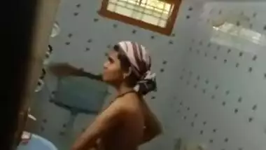 Desi skinny wears clothes and doesn't know about camera spying on her