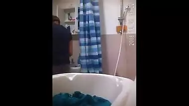 Escort girl bathing in nature's garb for porn video