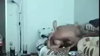 Young indian girl teaching indian how to wear a...