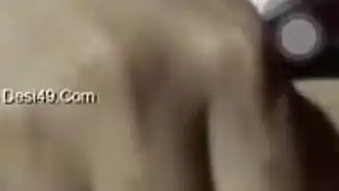 Smiling Indian aunty puts camera down to film her sunshaved peach