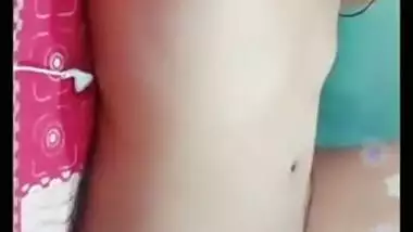 Desi gal grabs camera in time to record how she rubs own XXX pussy