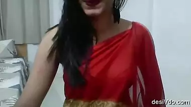 Desi Girl In Red Saree squeezing her boobs