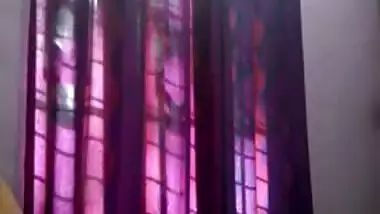 Tempting teen Desi lies down on her back to rub XXX body for sex show