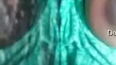 Desi mom in green sari gets partially naked in bed exposing breasts